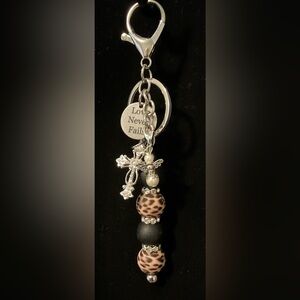 “LOVE NEVER FAILS” PURSE KEYCHAIN WITH CROSS & ANGEL CHARMS HANDMADE
